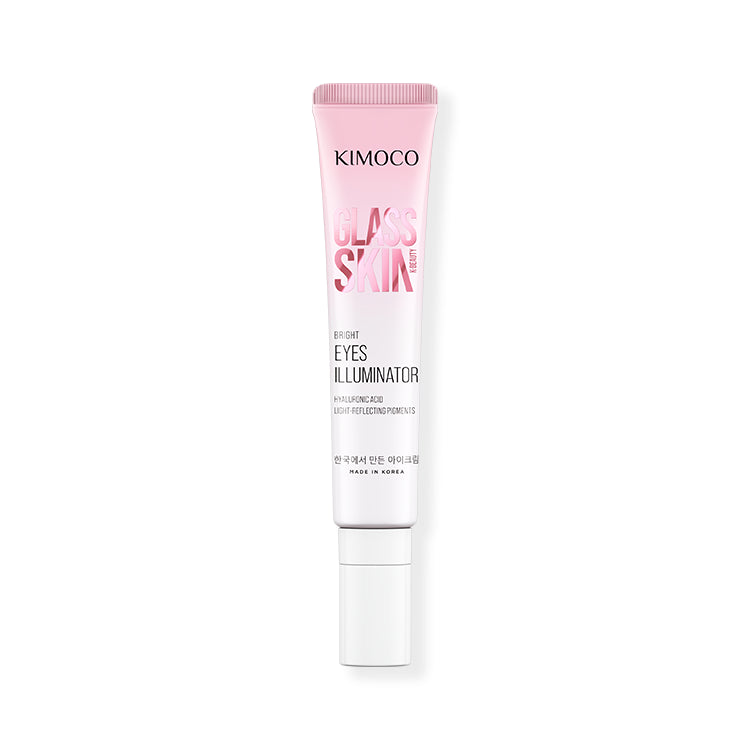 Zdjęcie na różowym tle: u góry ułożona ukośnie tuba "Kimoco Glass Skin Bright Eyes Illuminator", u dołu wyciśnięty z niej rozświetlający produkt w kształcie faliście ułożonej linii z widocznym brokatem.